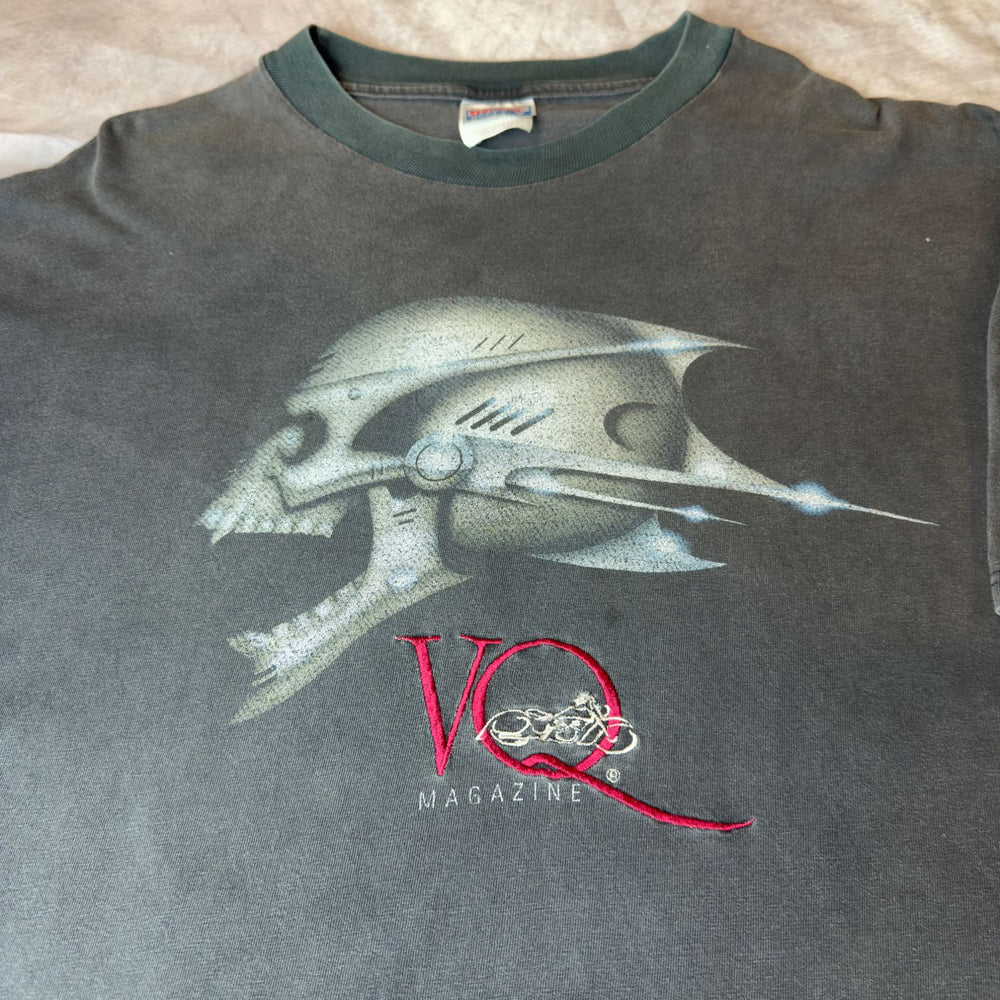 Front skull graphic and embroidered VQ Magazine logo close-up